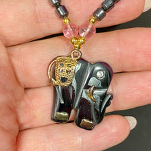 Load image into Gallery viewer, Carved Hematite With Rose Quartz Elephant
